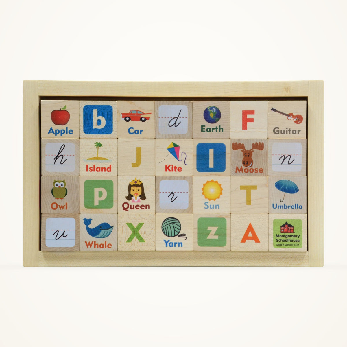 Maple Landmark Letter Picture natural wooden blocks arranged in their tray on a warm ivory background.
