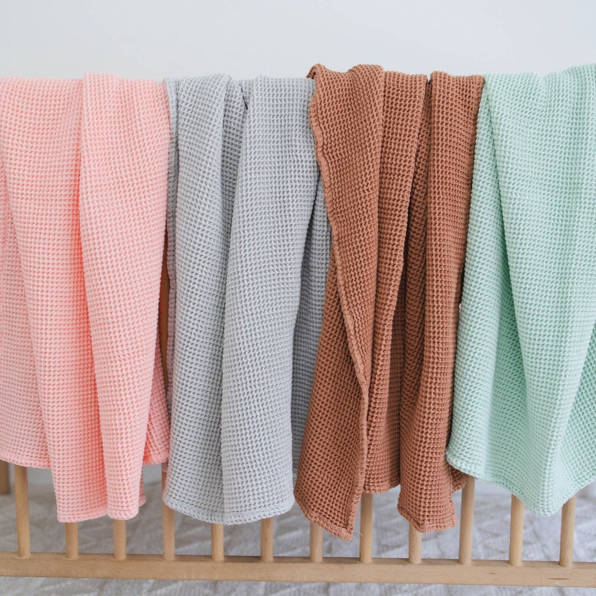 SpiritnSprout: Four waffle blankets hanging side by side