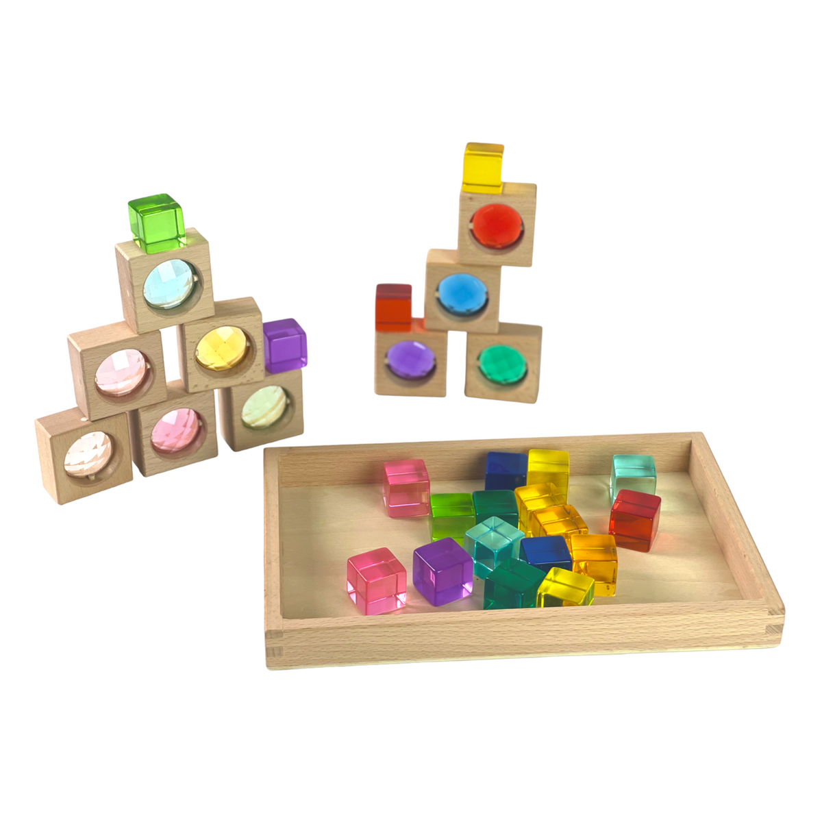 Gem window blocks stacked with lucite cubes beside the storage tray