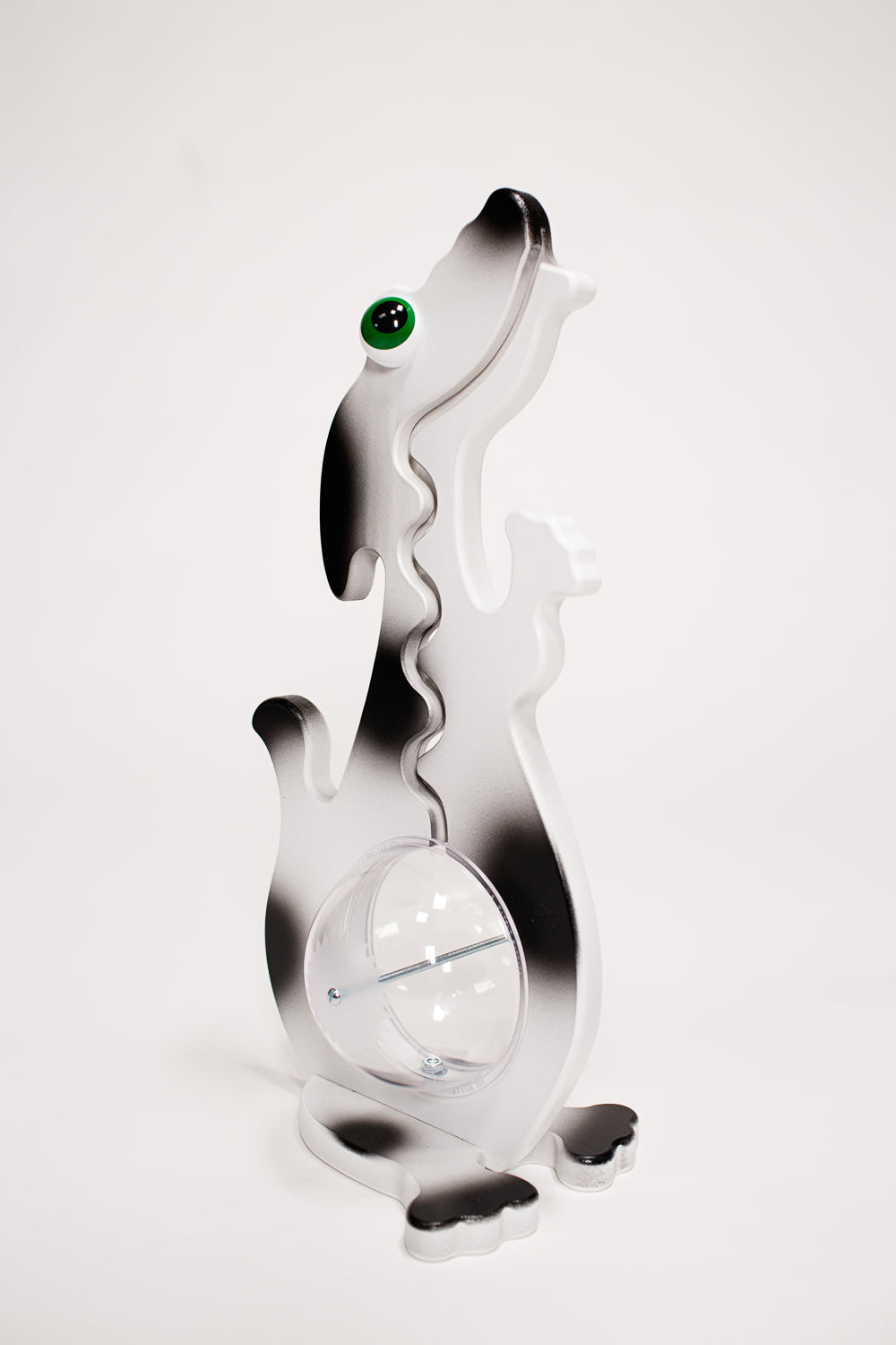 Angled view of the black and white dog coin bank
