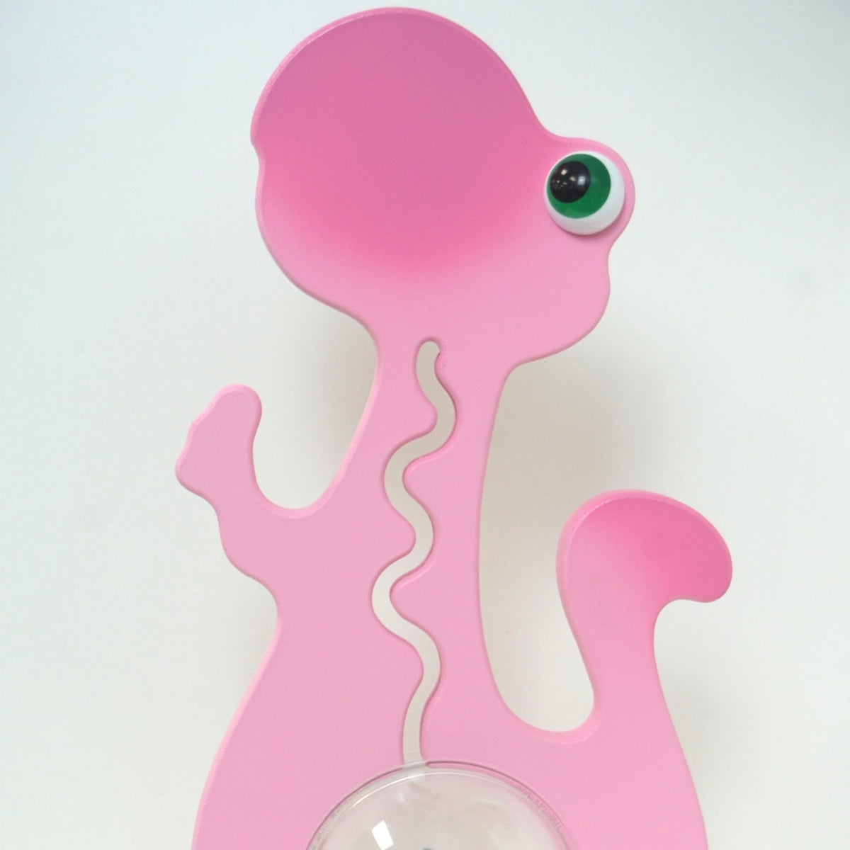 Reverse-side close-up of the pink dinosaur head and upper body