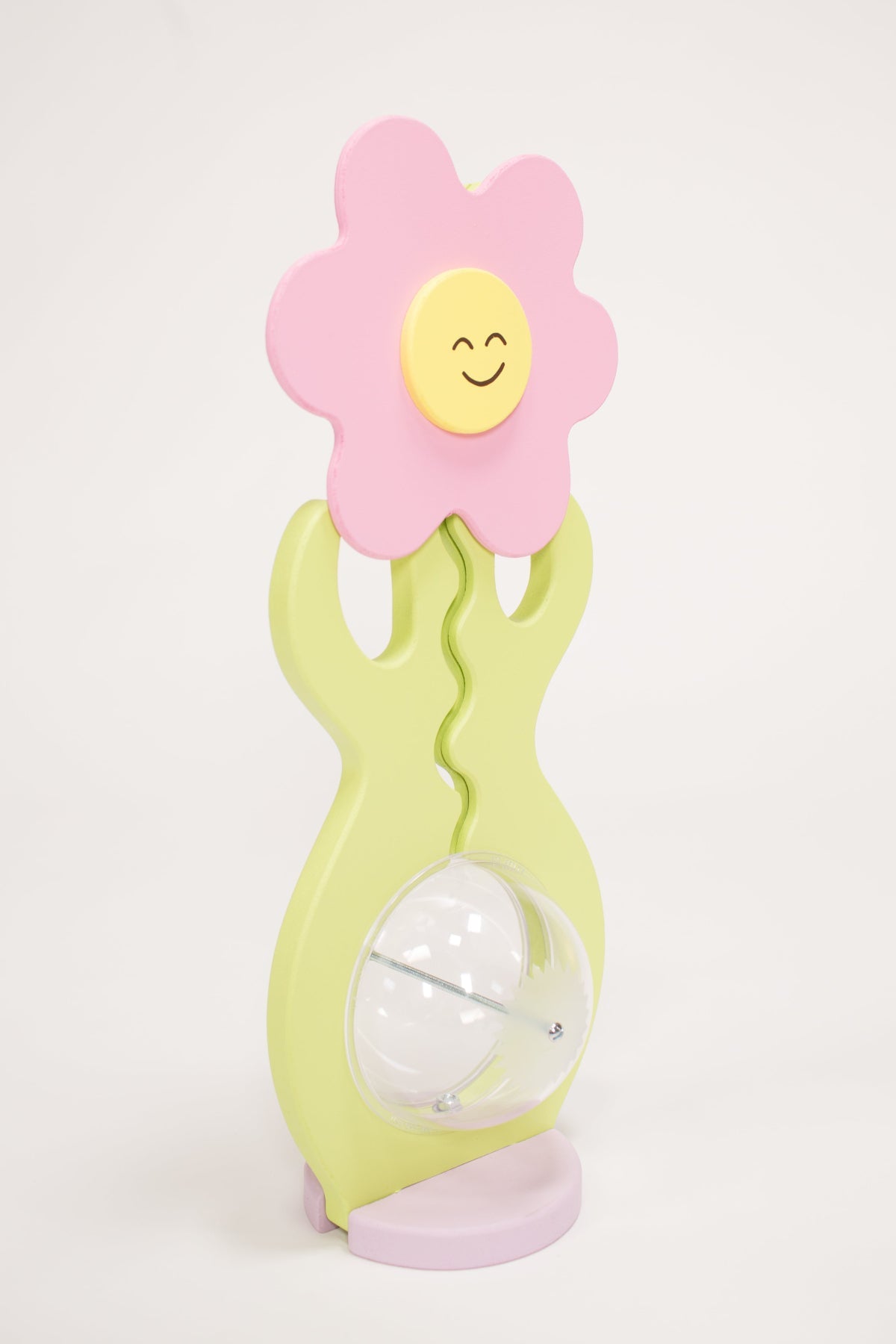 Angled view of the pink flower coin bank