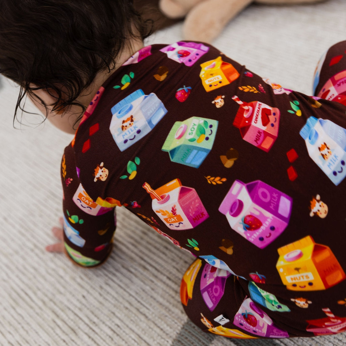 Rear view of the fabric on Bam & Stitch All the Milks! Convertible Romper.