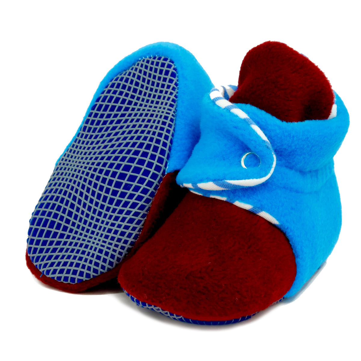 Blue-and-burgundy fleece baby booties with striped lining and snap straps, with one sole facing the camera on a white background.