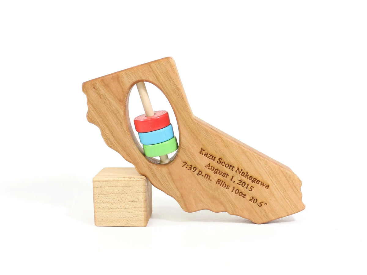 Bannor Toys California State Wooden Baby Rattle with example laser engraving and colored rattle discs