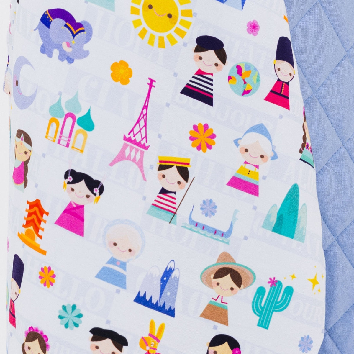 Close-up of the fabric pattern on Bam & Stitch Children of the World Blanket.