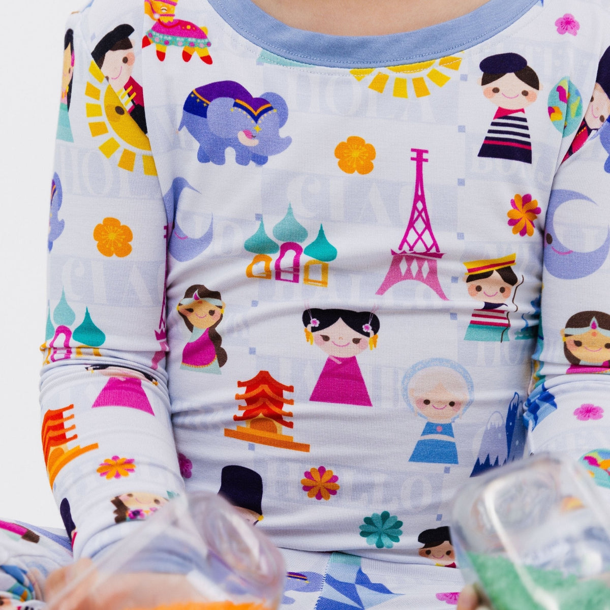 Close-up of the top and neckline on Bam & Stitch Children of the World Long Sleeve Pajamas.