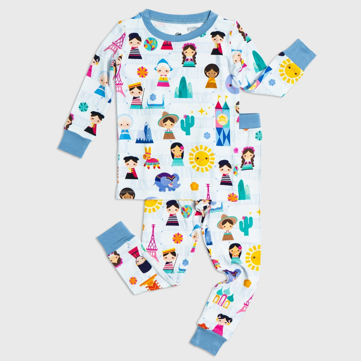 Flat lay of Bam & Stitch Children of the World Long Sleeve Pajamas, showing the matching top and bottoms.
