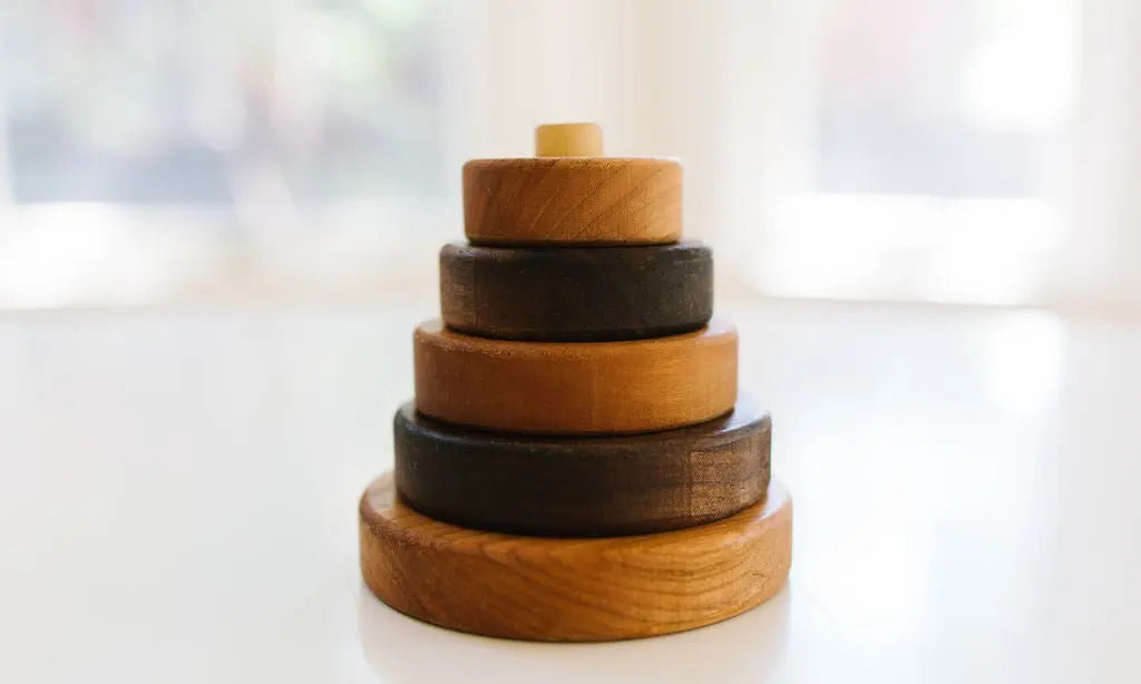 Bannor Circle Stacker assembled with alternating cherry and walnut rings