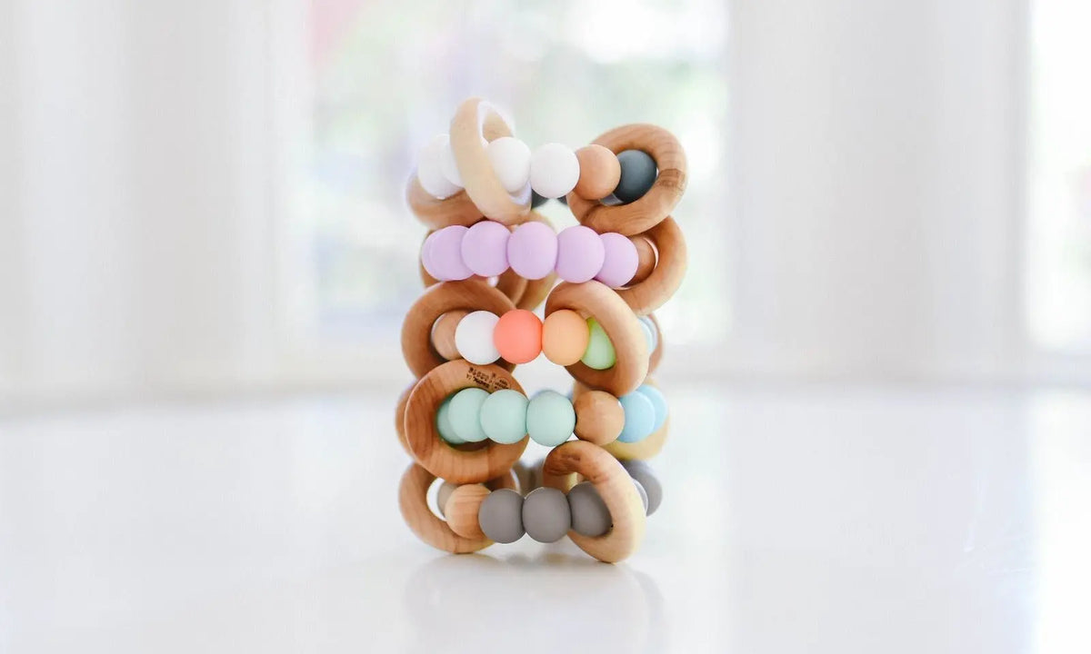 Bannor Toys Classic Teether collection view, showing wooden component and colored silicone