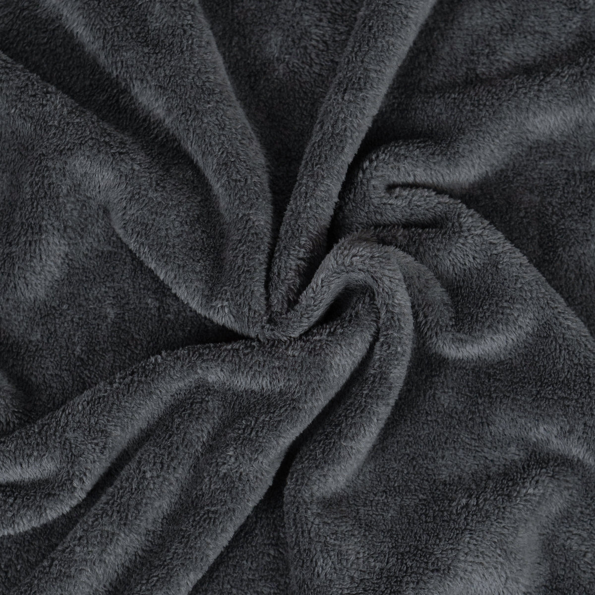Charcoal fleece blanket gathered to show texture.