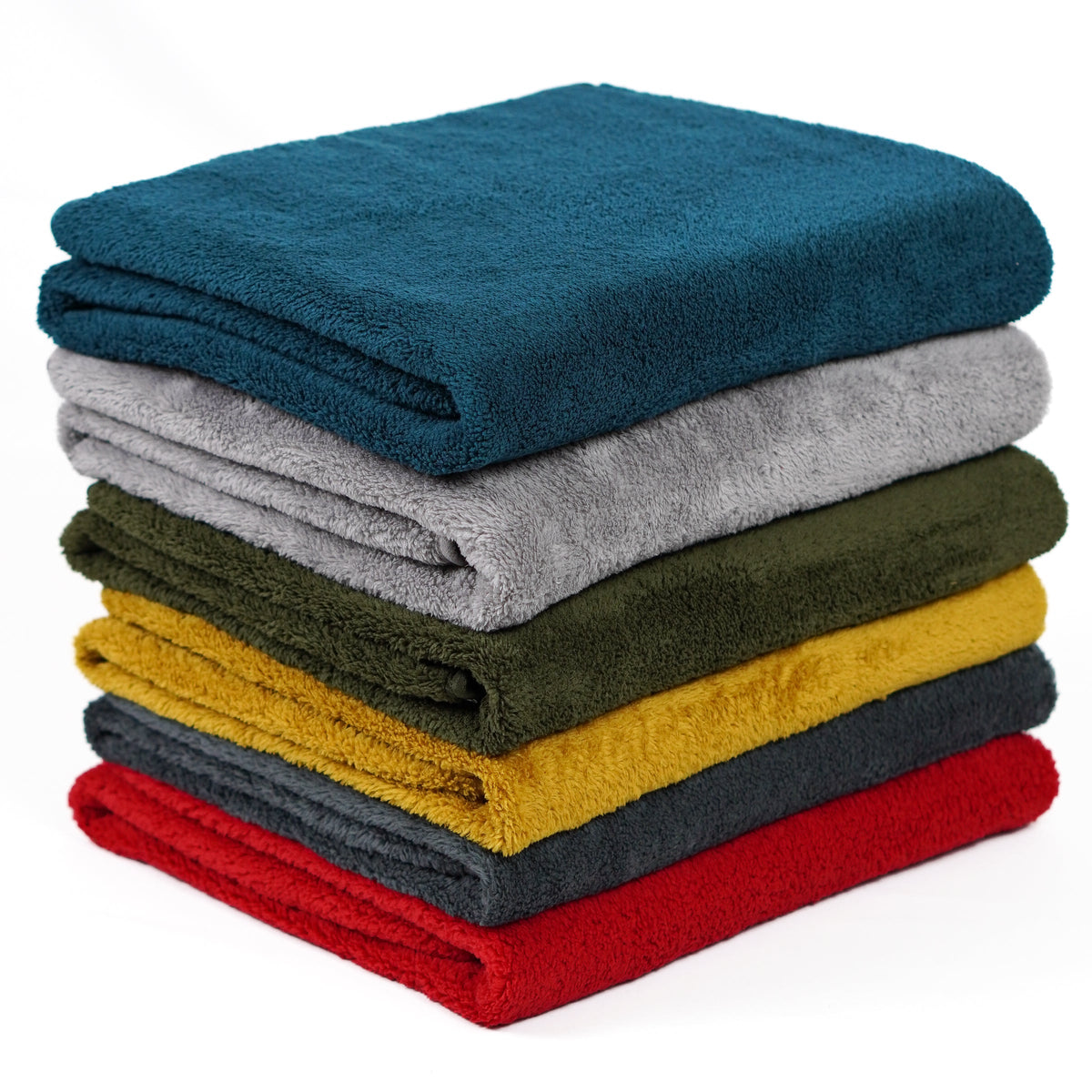Six fleece blankets stacked in teal, gray, olive, mustard, charcoal and red.