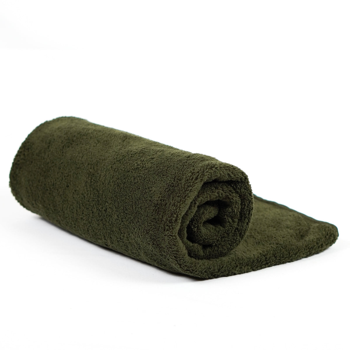 Olive green fleece blanket rolled on white.
