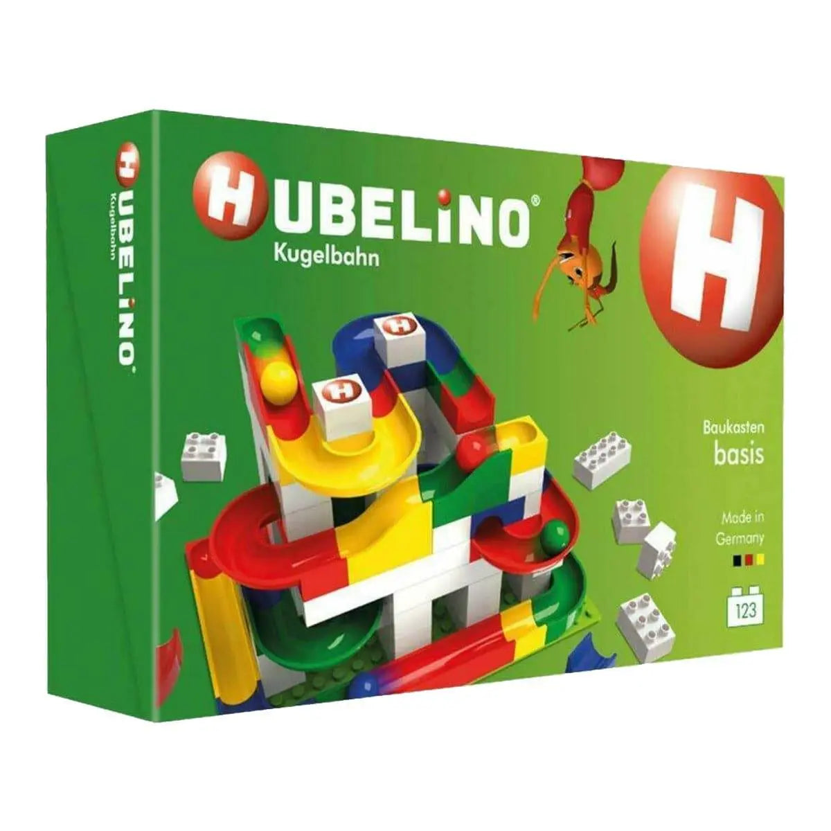 Green Hubelino Basic Building Box packaging showing the marble run and a 123-piece label