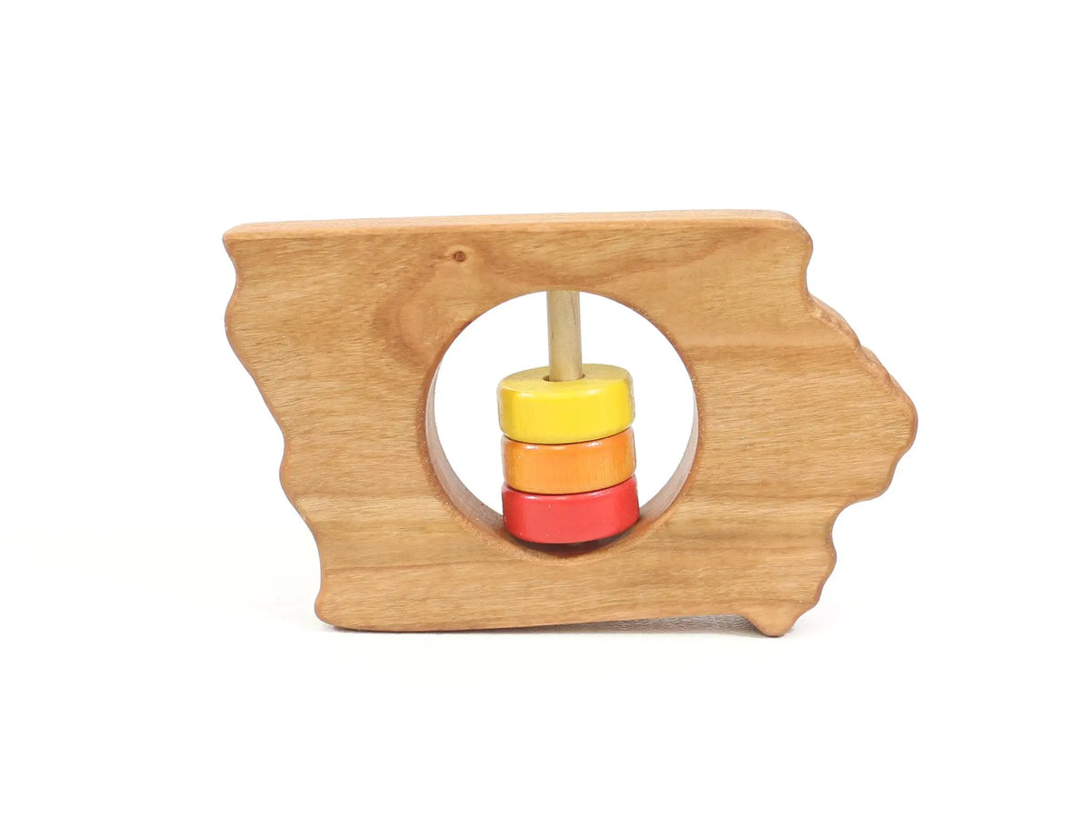 Bannor Toys Iowa State Wooden Baby Rattle, showing state-shaped cherry-wood body and colored rattle discs
