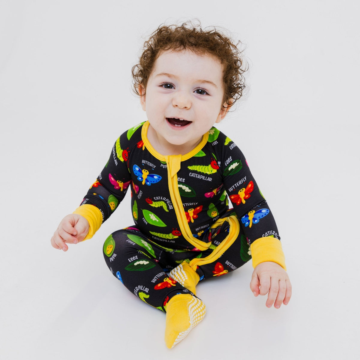 Baby sitting in Bam & Stitch It's Morphing Time! Convertible Romper.