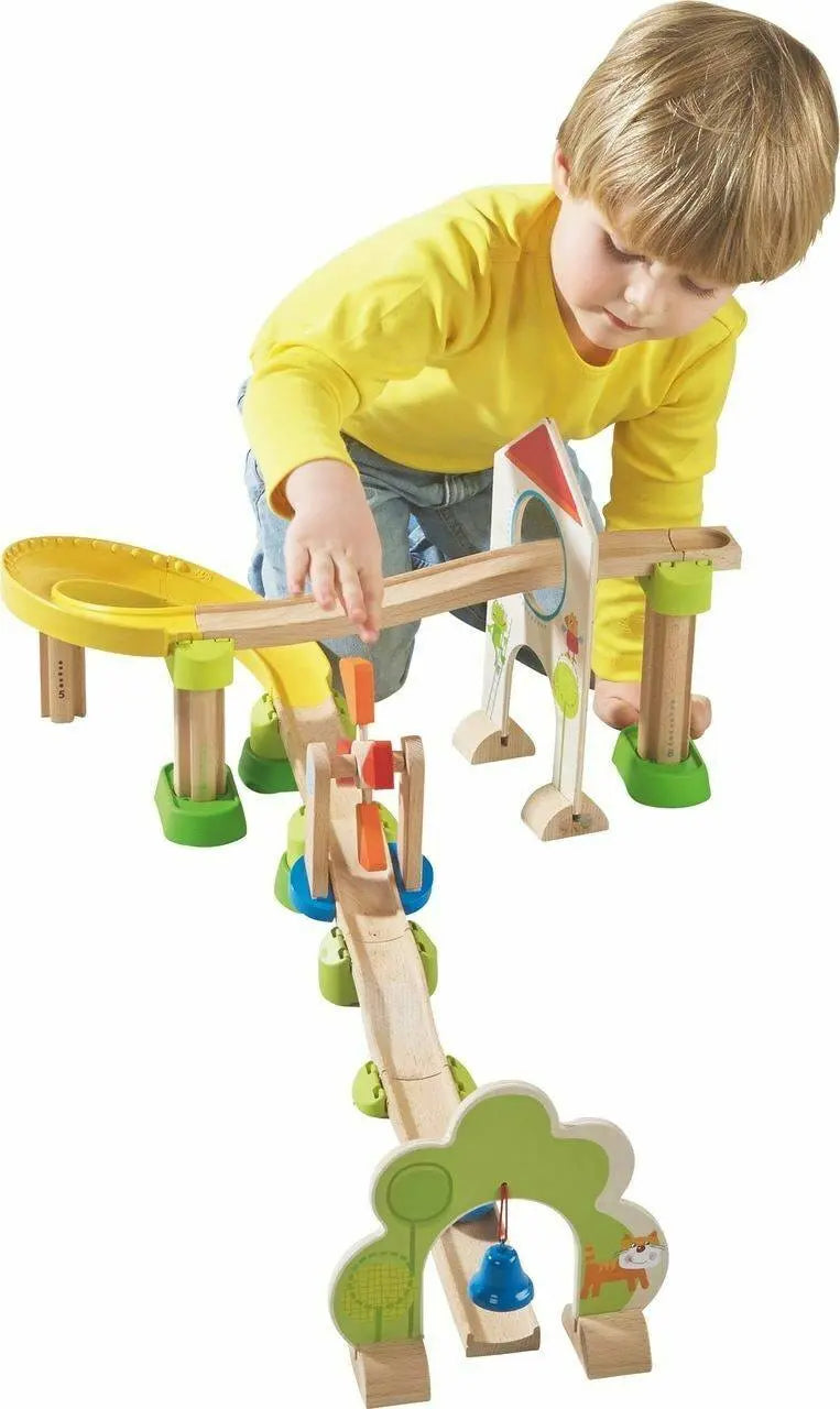 A child playing with the Kullerbu Windmill track shown from the bell end