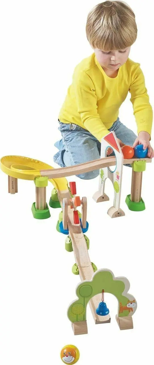 A child and the assembled Kullerbu Windmill track shown from the tree bell end