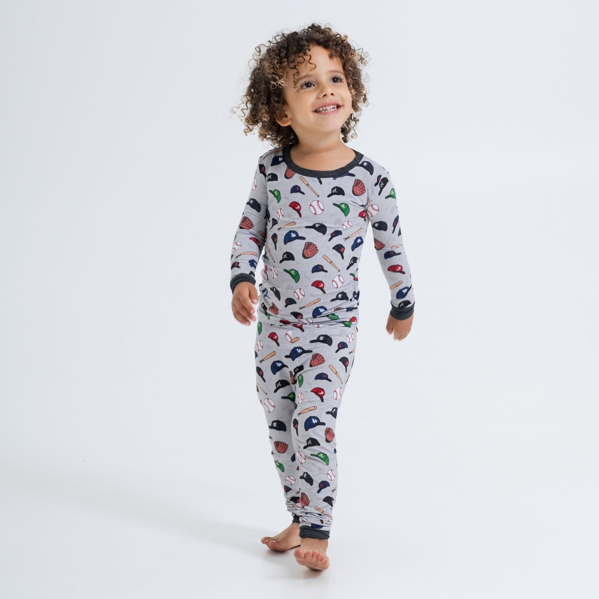 Child wearing Bam & Stitch Major League Buddies Long Sleeve Pajamas.