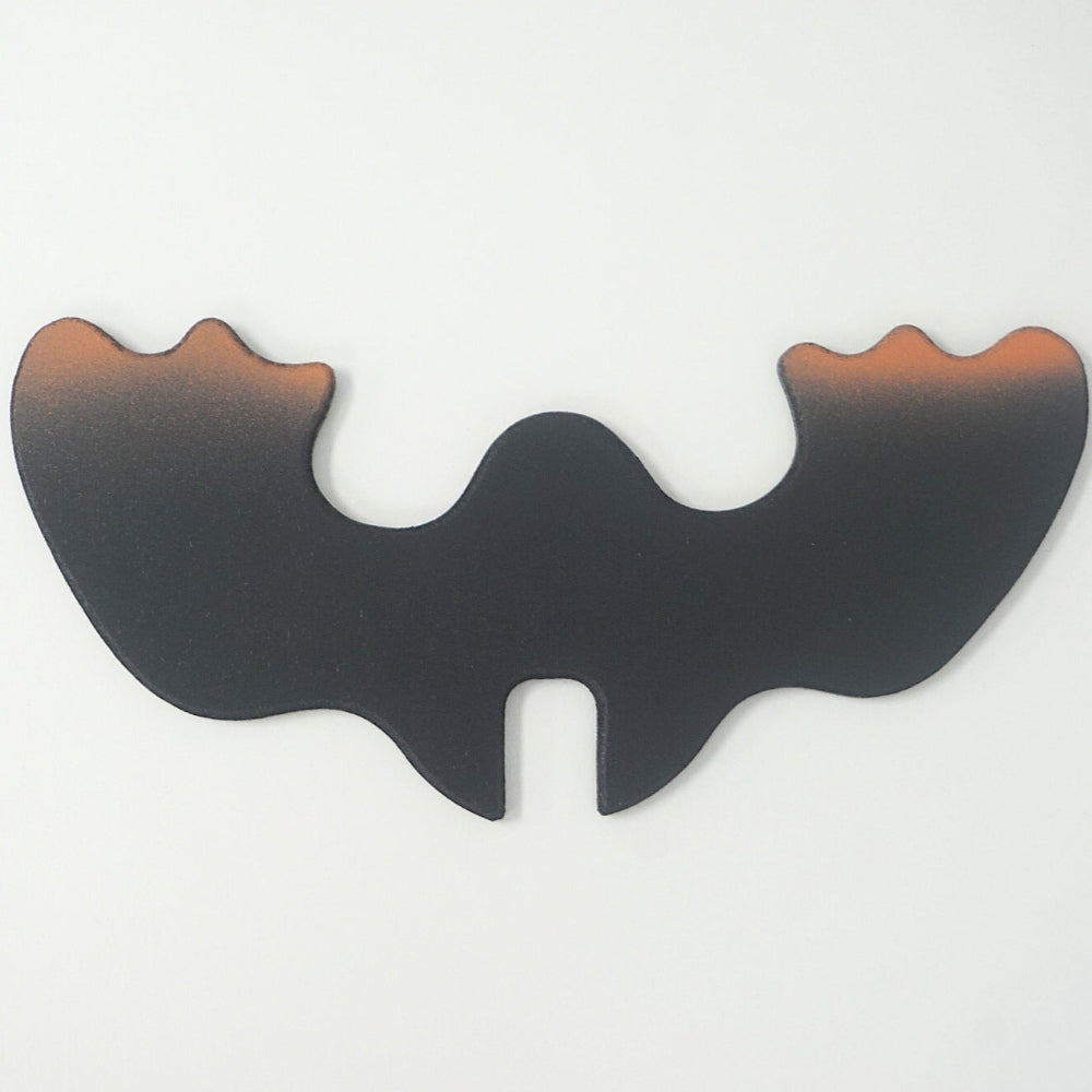 Detached moose antler piece with center cutout and brown-to-black finish