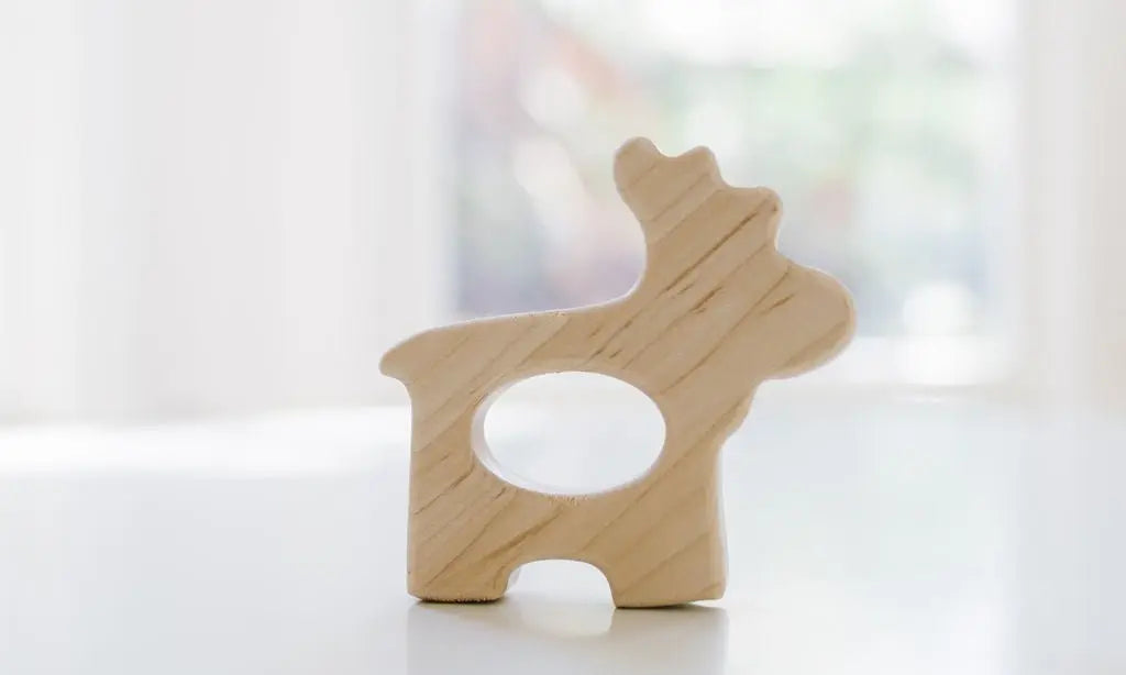 Bannor Toys Moose Wooden Grasping Toy, showing smooth wooden outline with an open grasping space