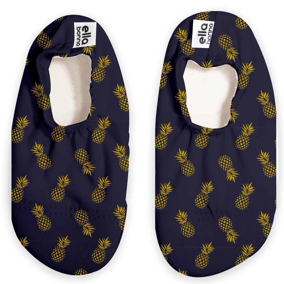 Top view of a pair of navy slip-on water shoes with yellow pineapple print on a white background.