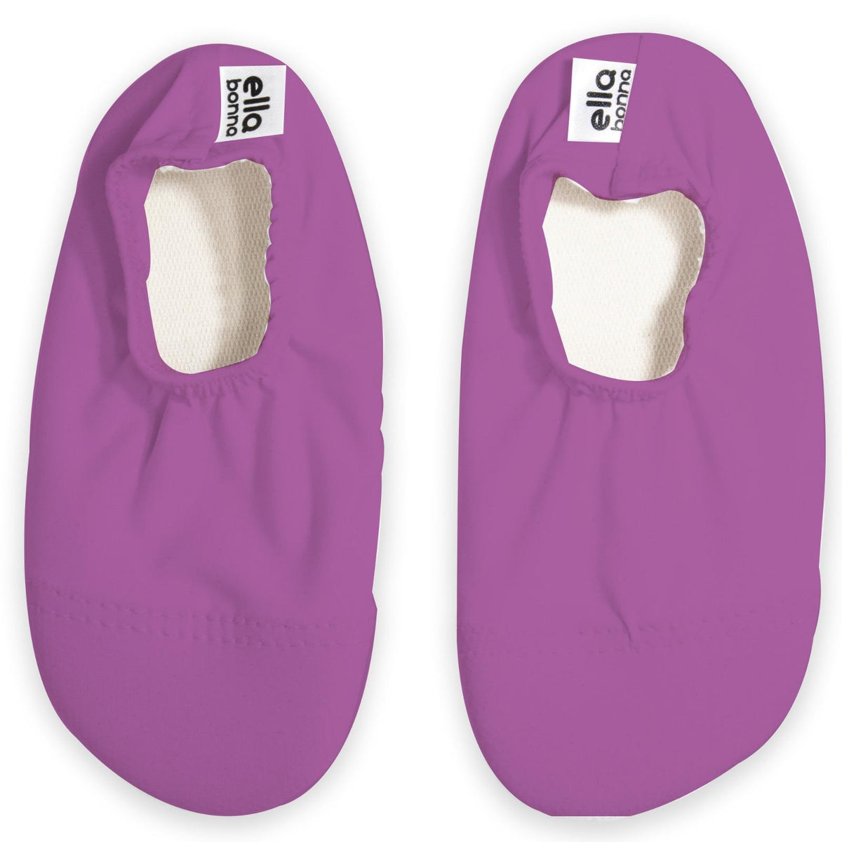 Top view of a pair of purple slip-on water shoes with cream lining on a white background.