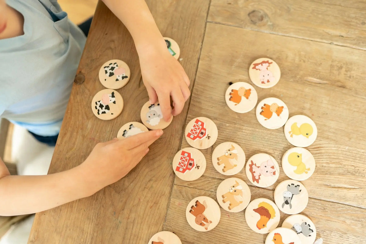 Lifestyle photo showing farm matching tiles with a child