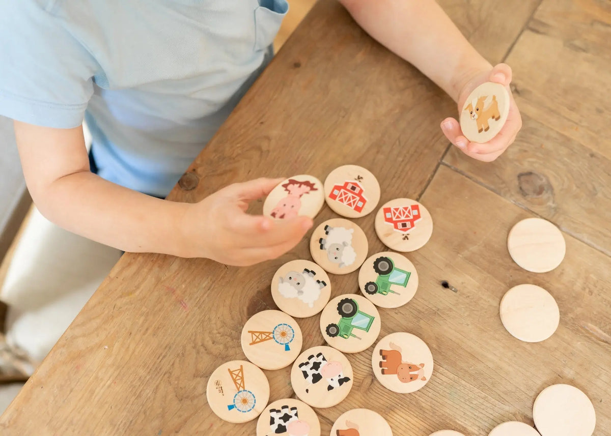 Lifestyle photo showing farm matching tiles with a child