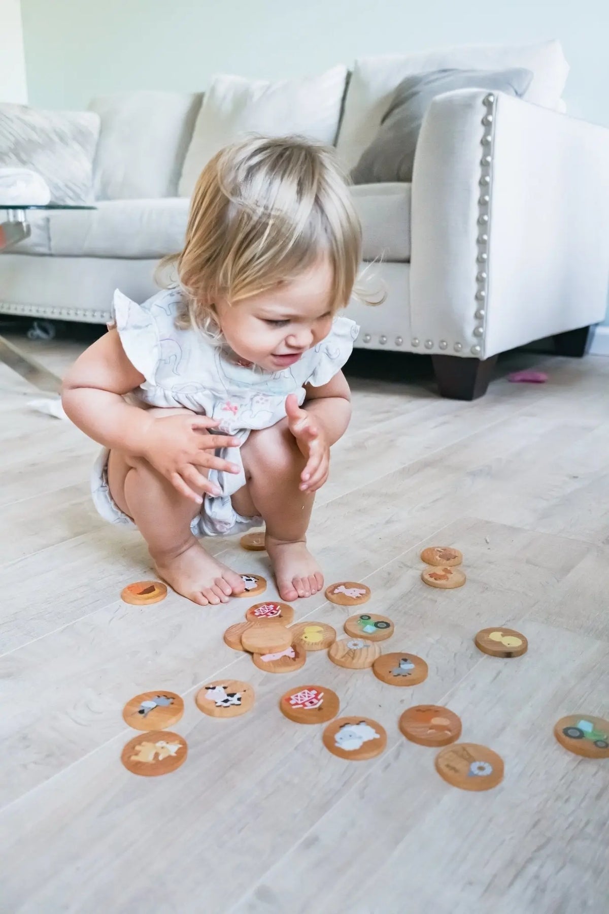 Lifestyle photo showing farm matching tiles with a child