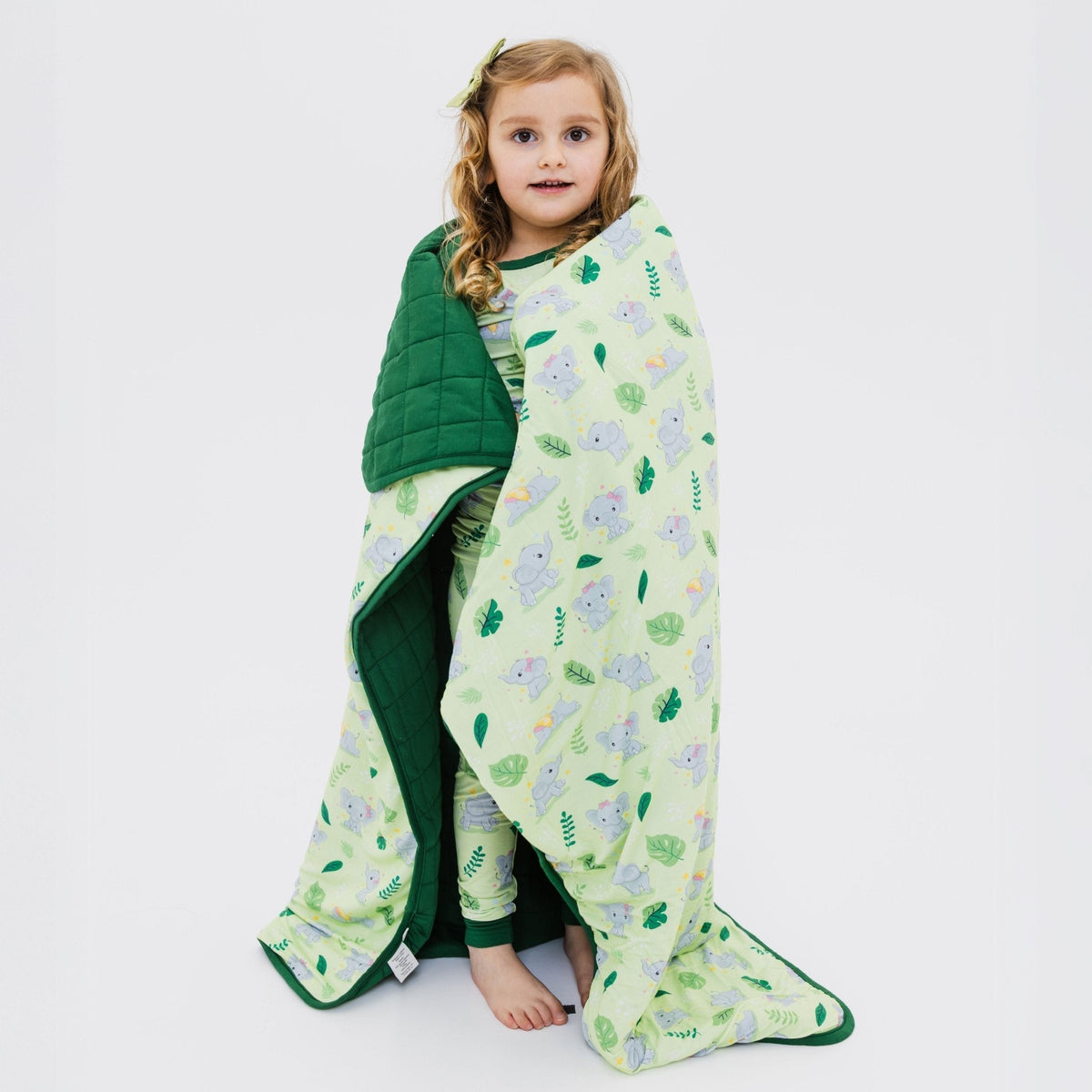 Child wrapped in Bam & Stitch Playfully Strong Blanket.