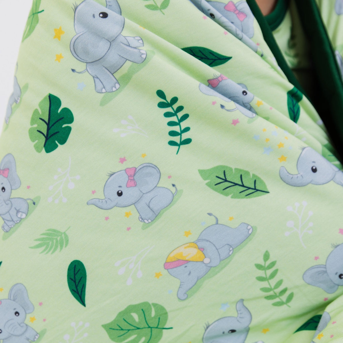 Close-up of Bam & Stitch Playfully Strong Blanket, showing the outer fabric and quilted reverse.