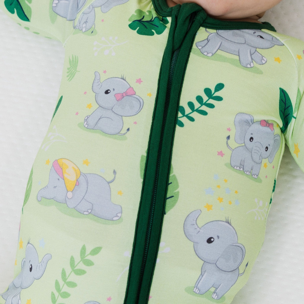 Close-up of the front zipper and fabric on Bam & Stitch Playfully Strong Convertible Romper.