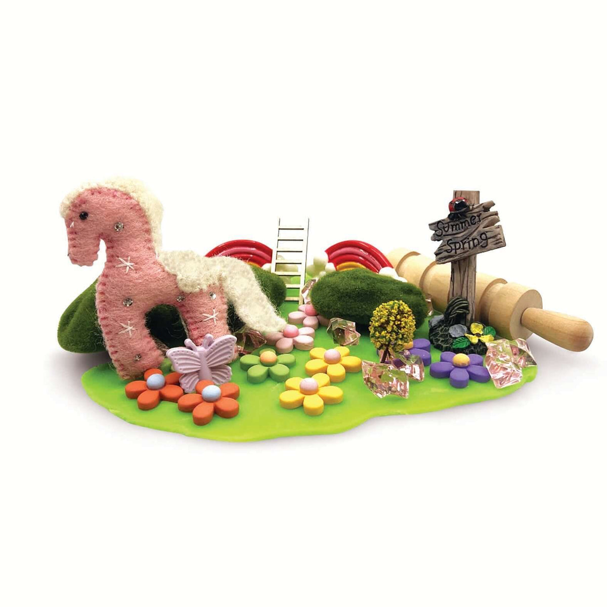 Ponyville playdough scene with pink pony, flower decorations, rainbows and rolling pin