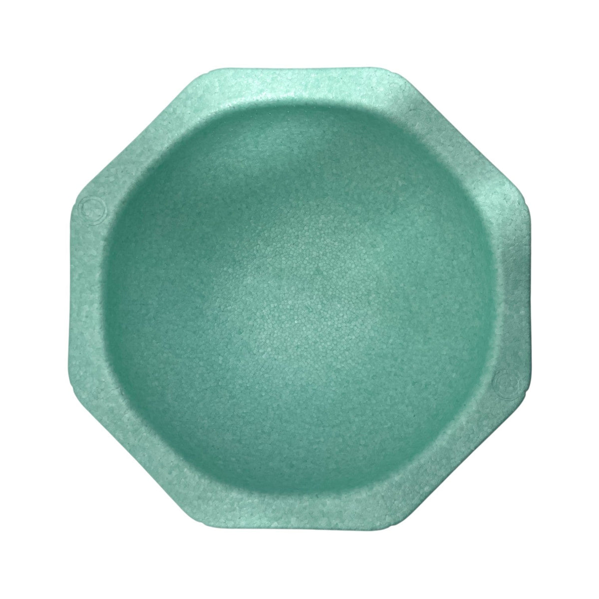 Mint green stepping stone showing recessed top