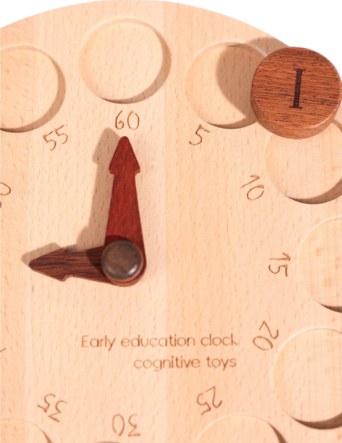 Close-up of the Arabic-numeral clock face and movable hands