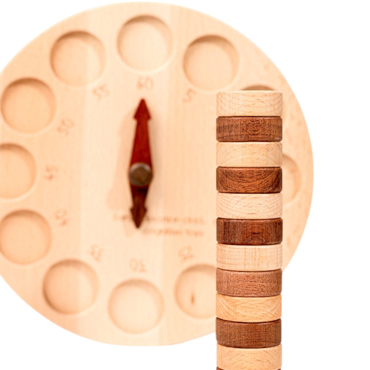 Side view of the learning clock and stacked wooden numeral pieces