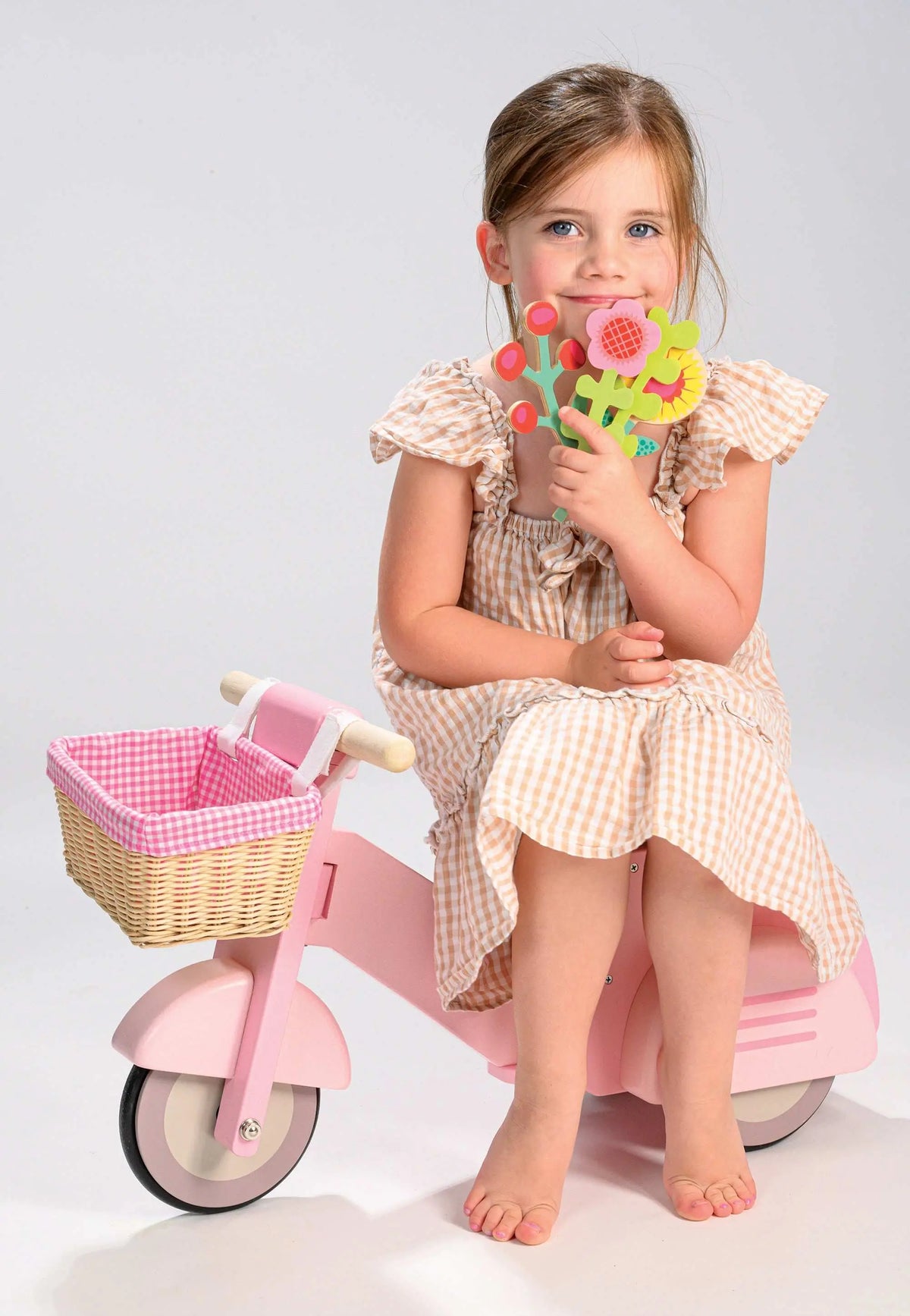 Tender Leaf Pink Wooden Ride-On Scooter with Basket