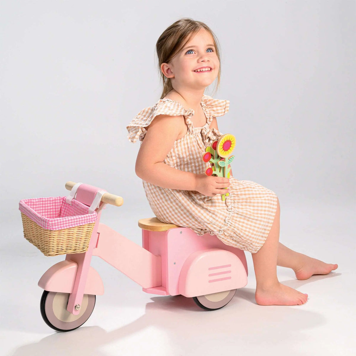 Tender Leaf Pink Wooden Ride-On Scooter with Basket