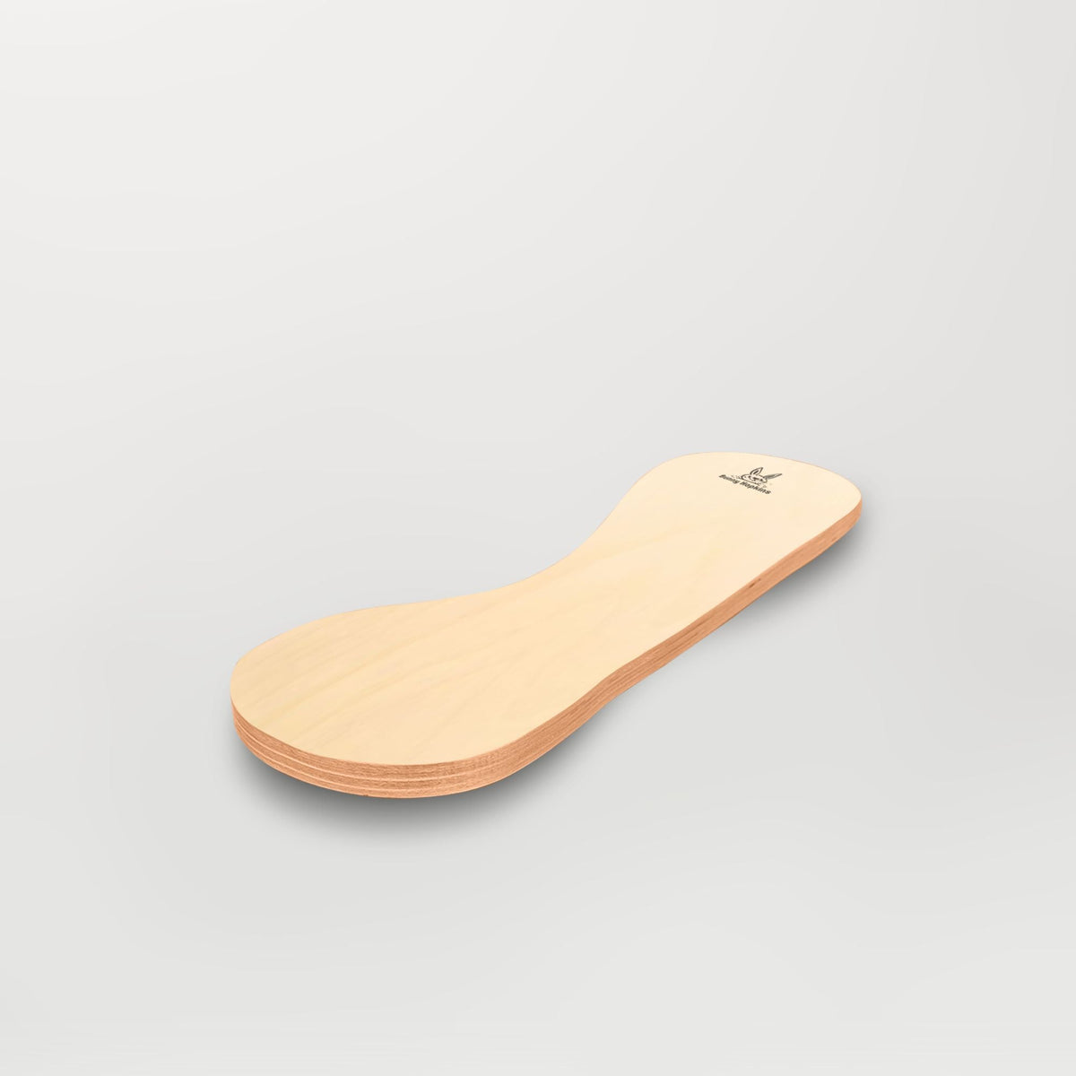 Light natural-tone Spinzee board with a narrow center, angled view.