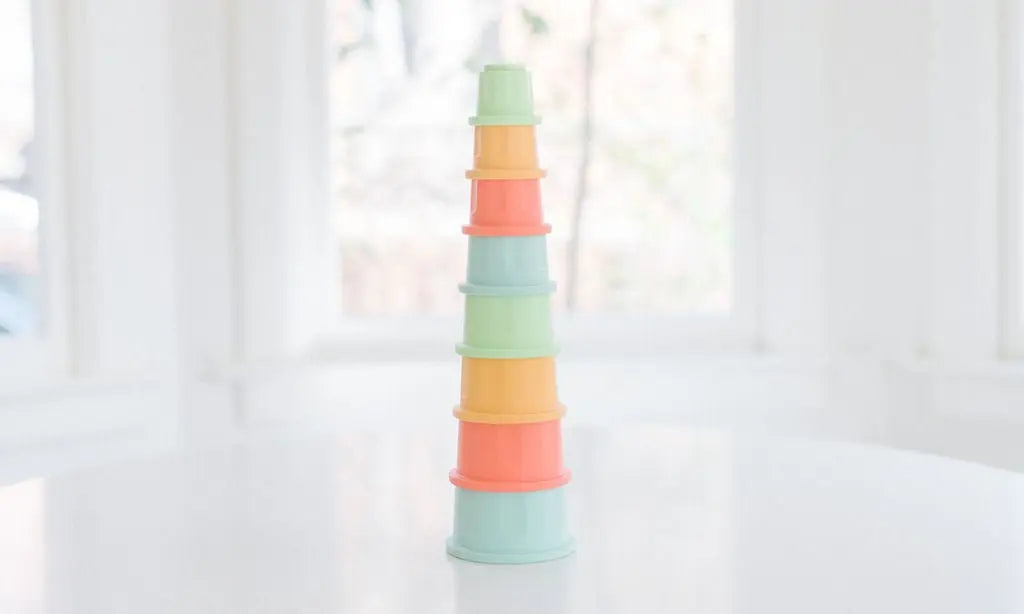 Bannor silicone stacking cups assembled into a tall multicolored tower