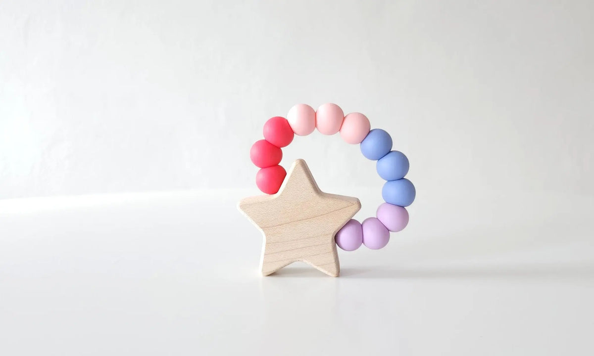 Star Charm Teether with pink, purple and blue silicone beads