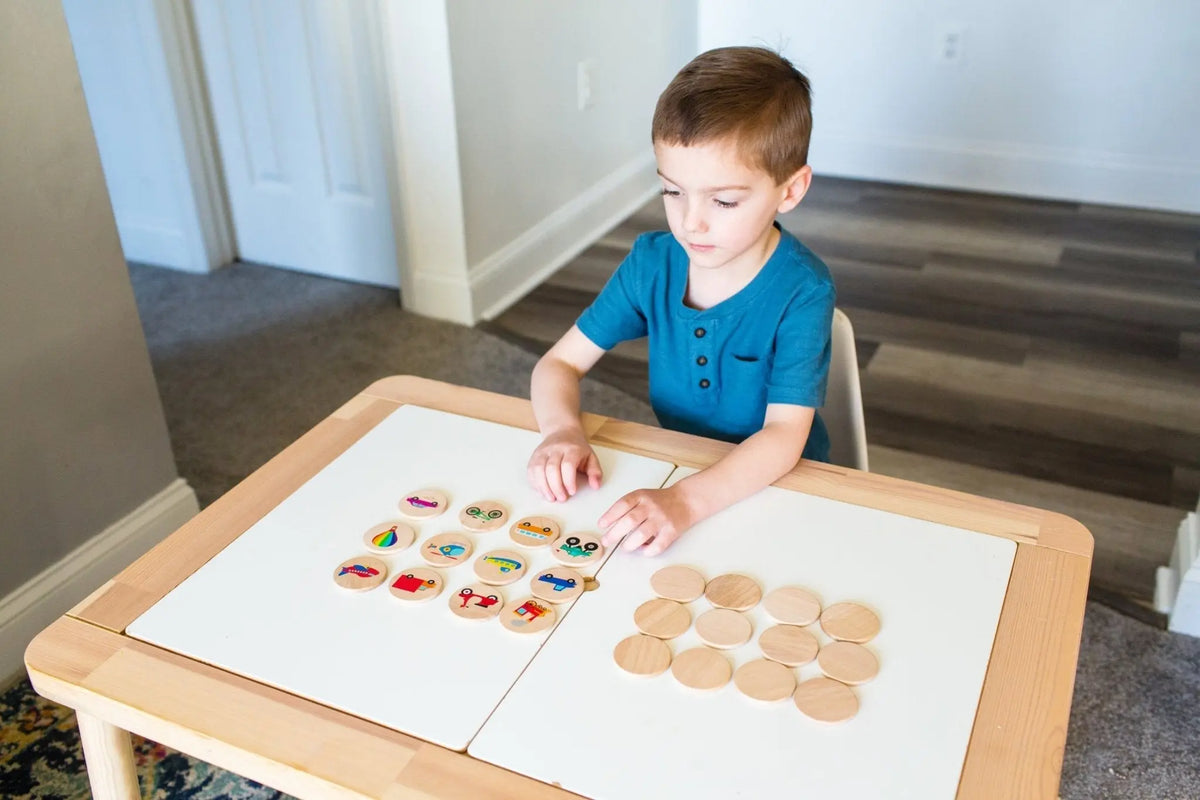 Lifestyle photo showing transportation matching tiles with a child