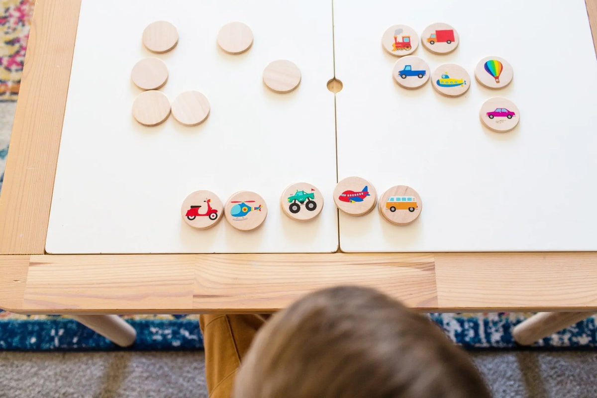 Lifestyle photo showing transportation matching tiles with a child