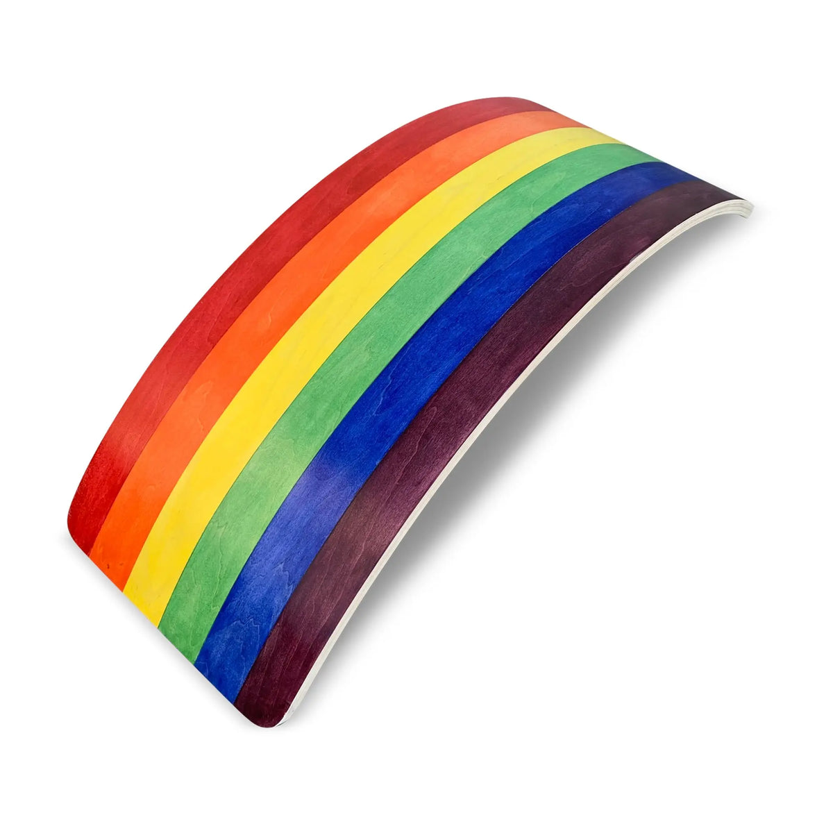 Rainbow-striped wobble board in an arch position, angled view on white.