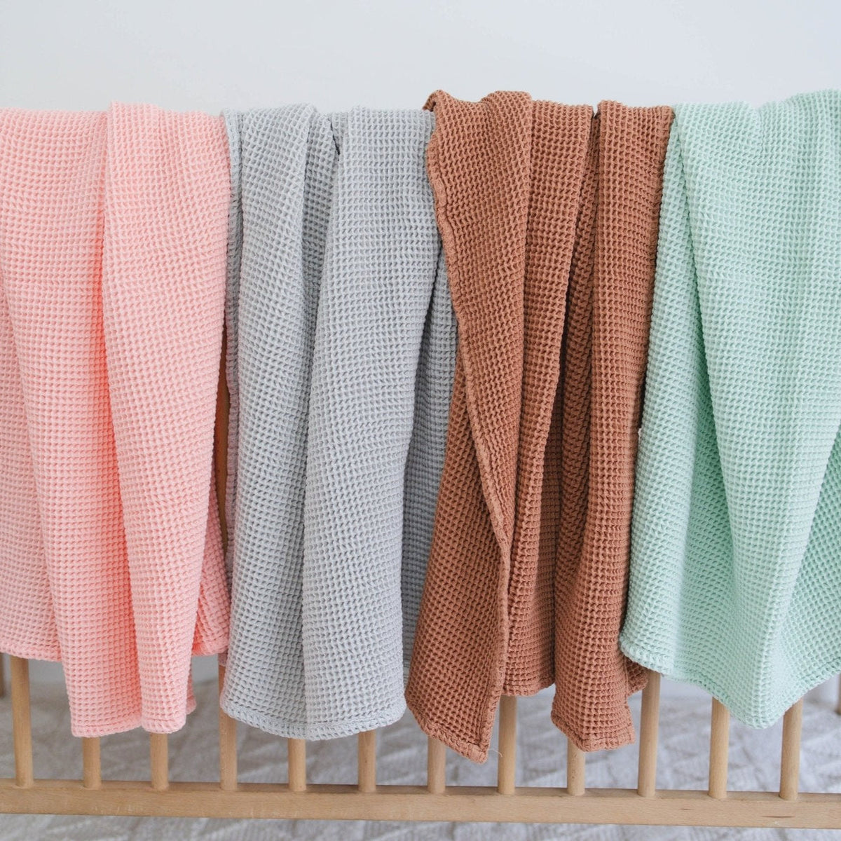 SpiritnSprout: Rose pink, grey, cinnamon and mint blankets hanging side by side