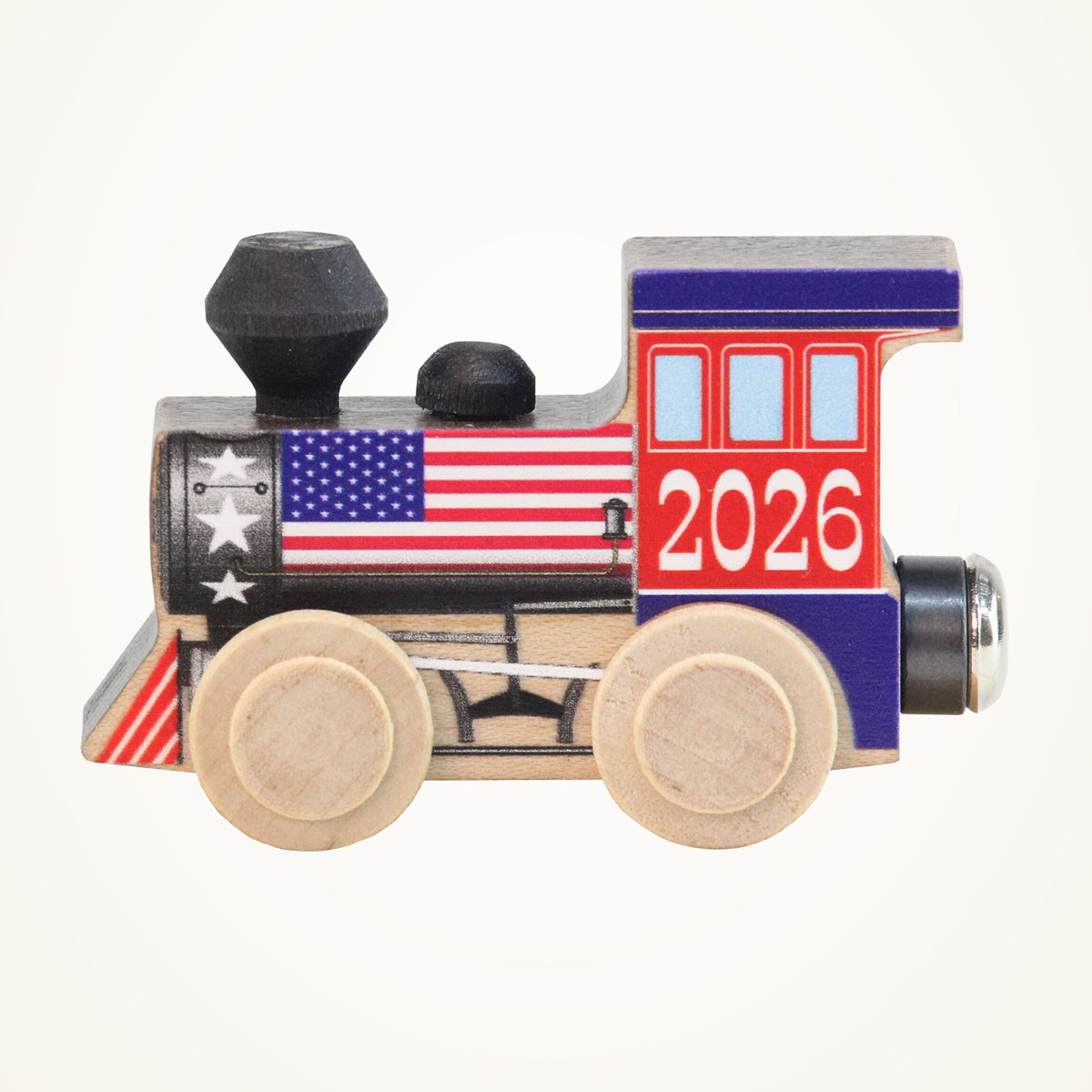 Maple Landmark NameTrains 2026 Engine photographed on a warm ivory background.