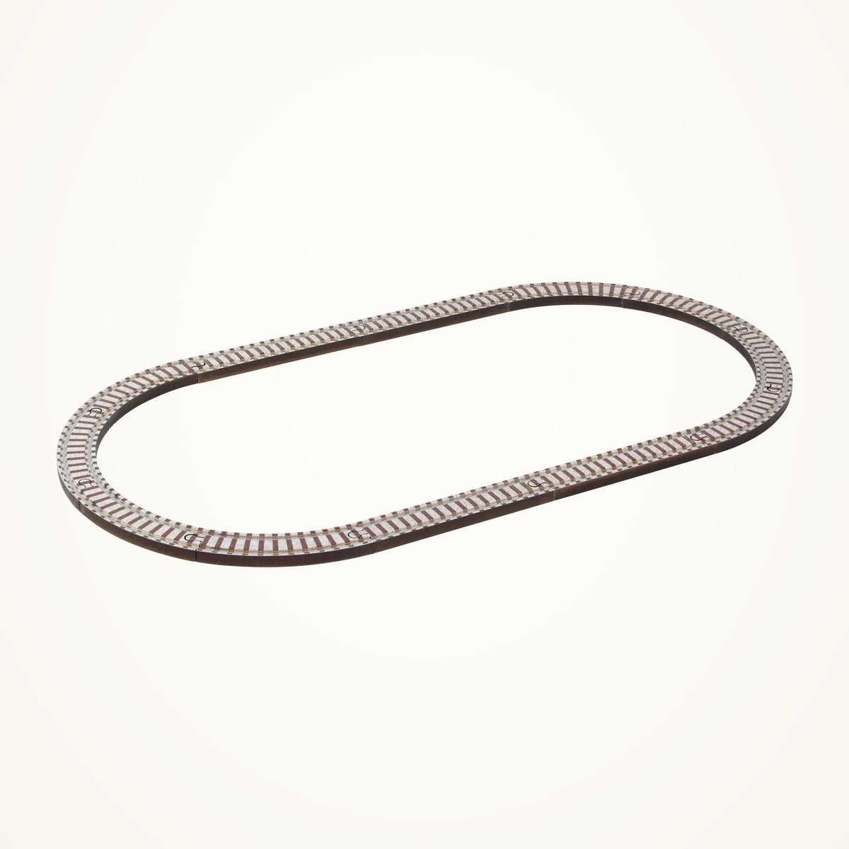 Maple Landmark 12-piece Oval Track Set photographed on a warm ivory background.