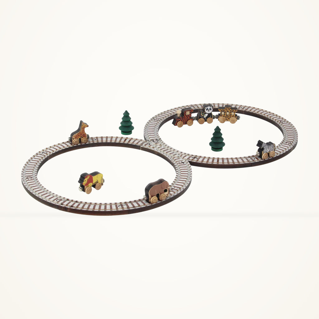 Maple Landmark Safari Animal Train Set with figure-eight track and animal cars on a warm ivory background.
