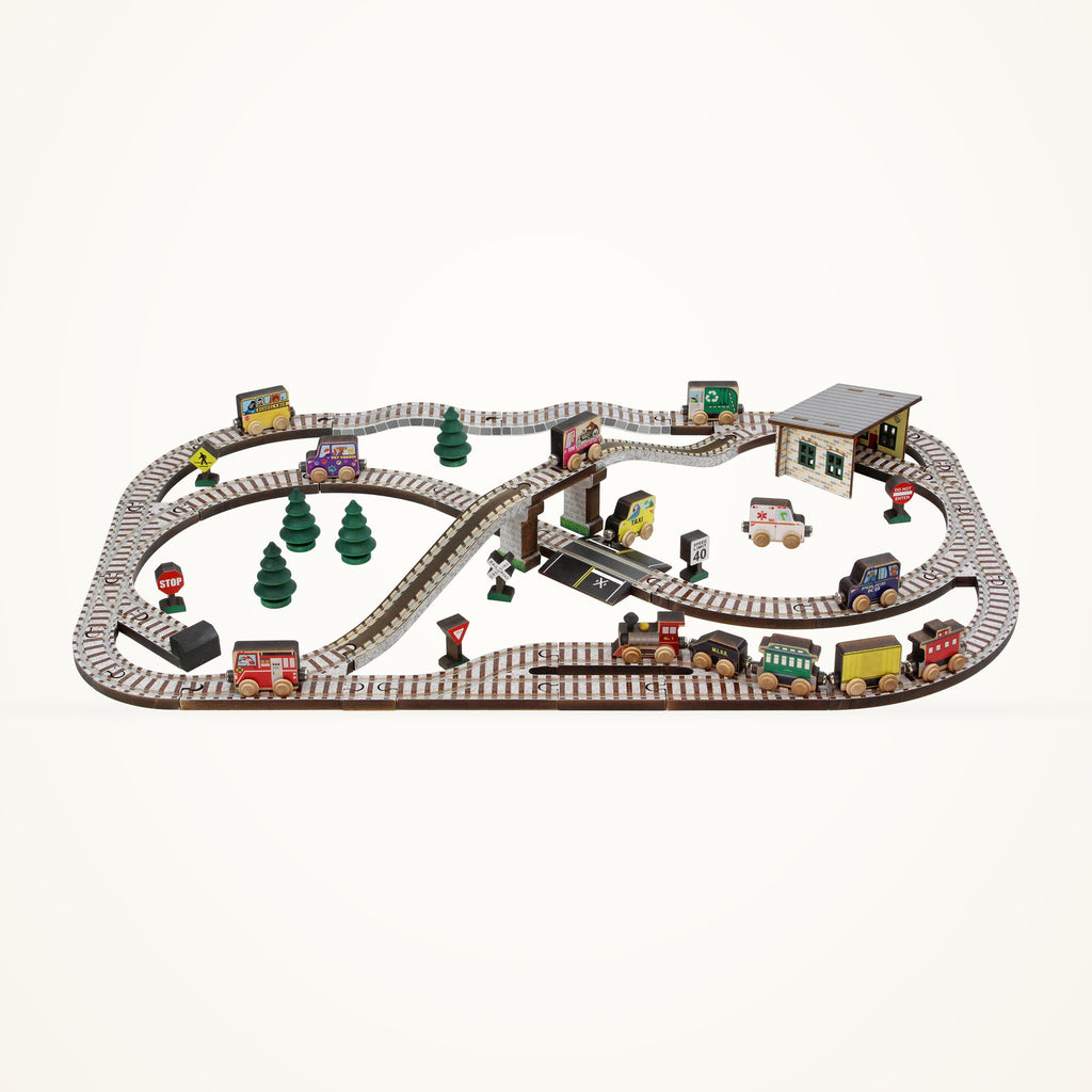 Maple Landmark wooden Town Train Set with tracks, vehicles, buildings and trees on a warm ivory background.